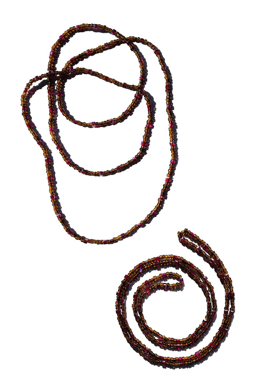 Two dark brown beaded necklaces on a white background